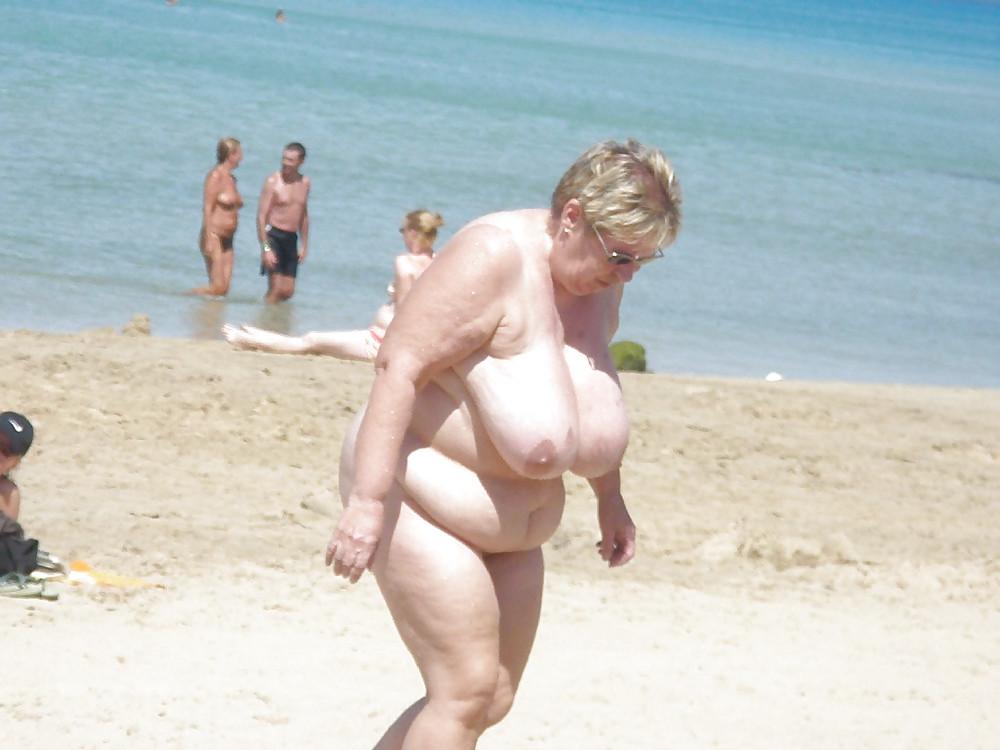 25P Old granny at beach 