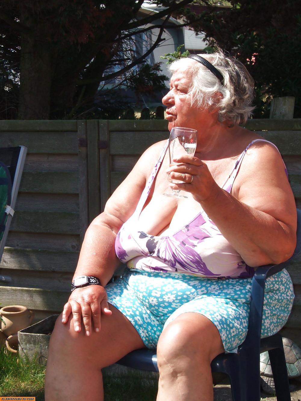 25P Old granny at beach 