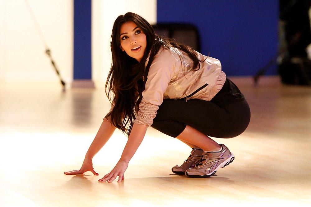 9P Kim Kardashian working her butt out in tight clothes