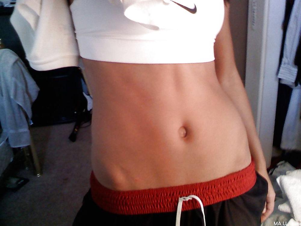 11P Sporty Asian girl undresses