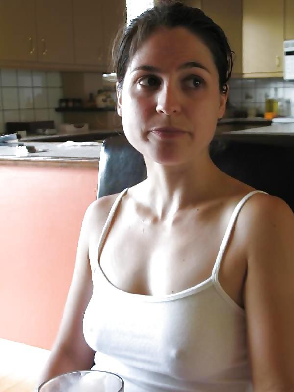 25P Erected nipples through blouse ....