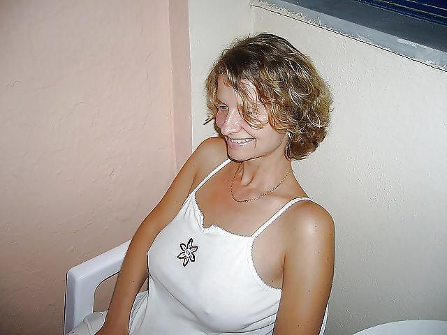 25P Erected nipples through blouse ....