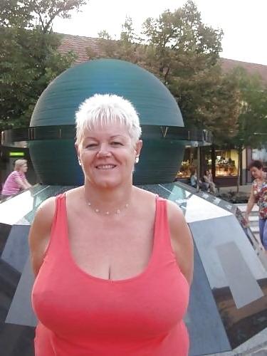 20P Not naked busty mature women 2.