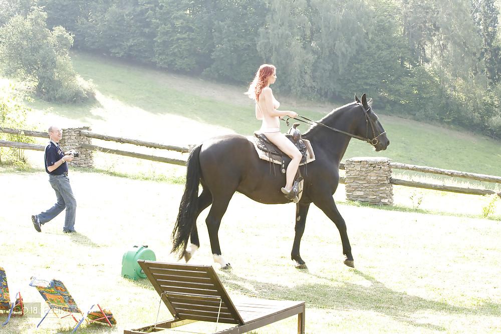 25P Women and horse