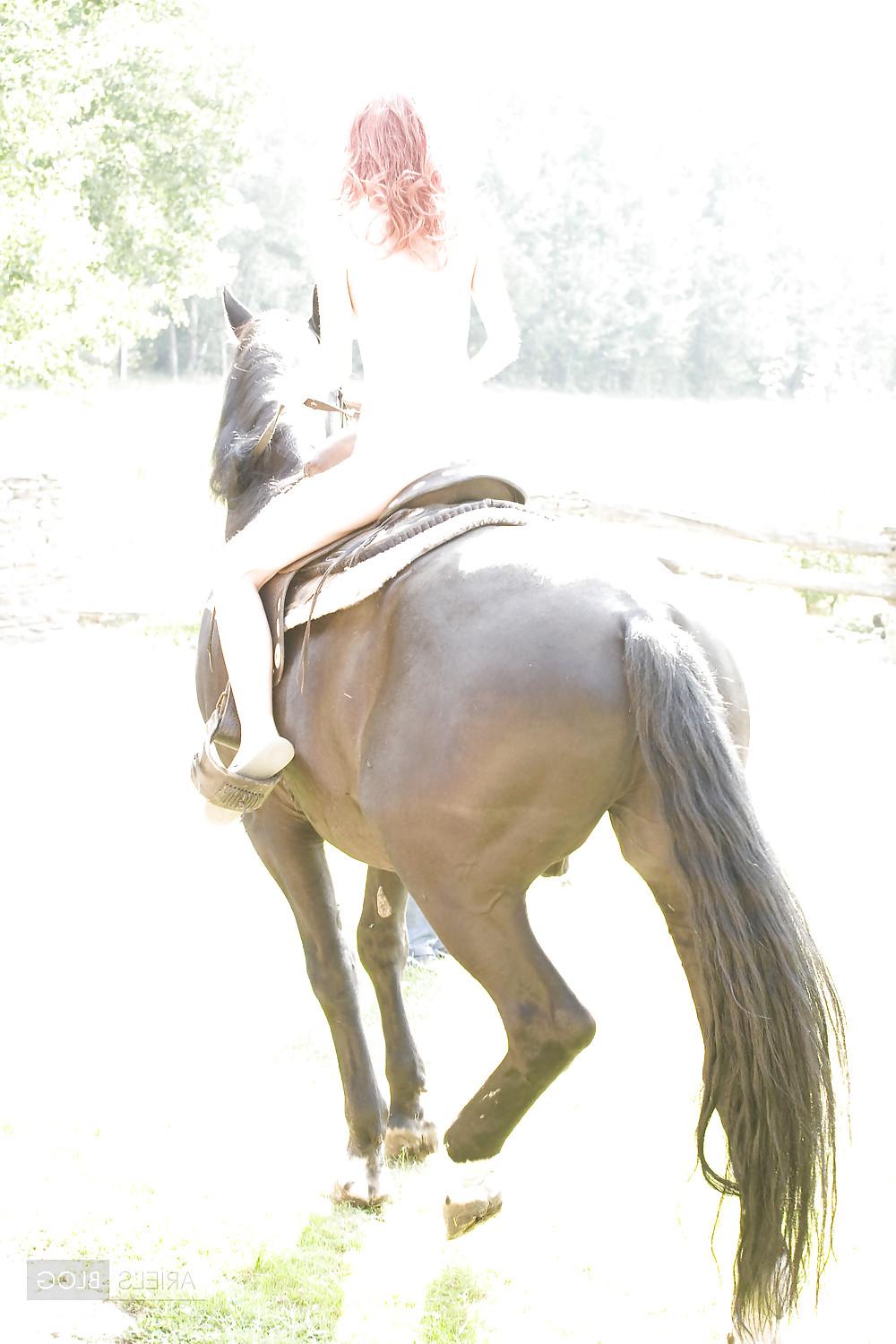 25P Women and horse