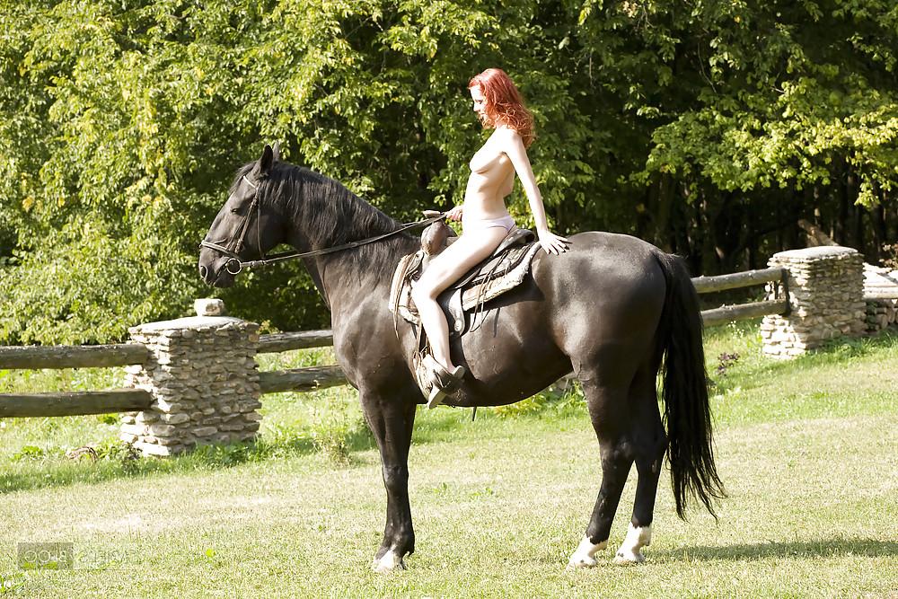 25P Women and horse