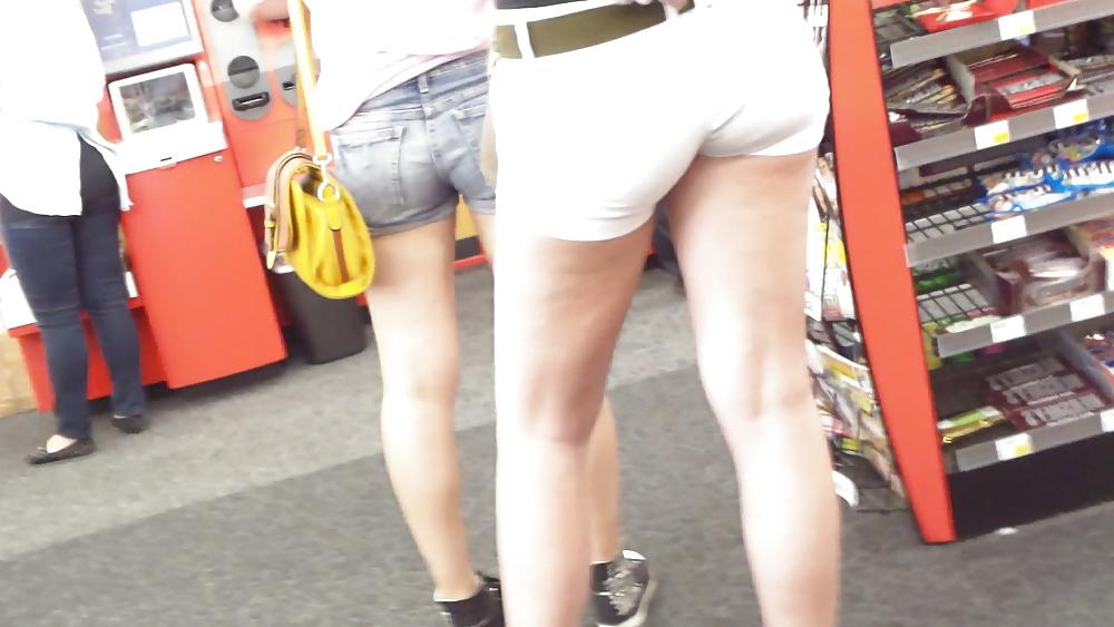 23P Teen ass crack & butt in tight white shorts