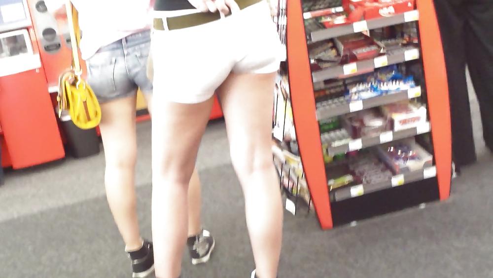 23P Teen ass crack & butt in tight white shorts