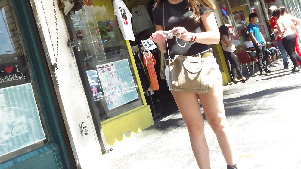 23P Teen ass crack & butt in tight white shorts