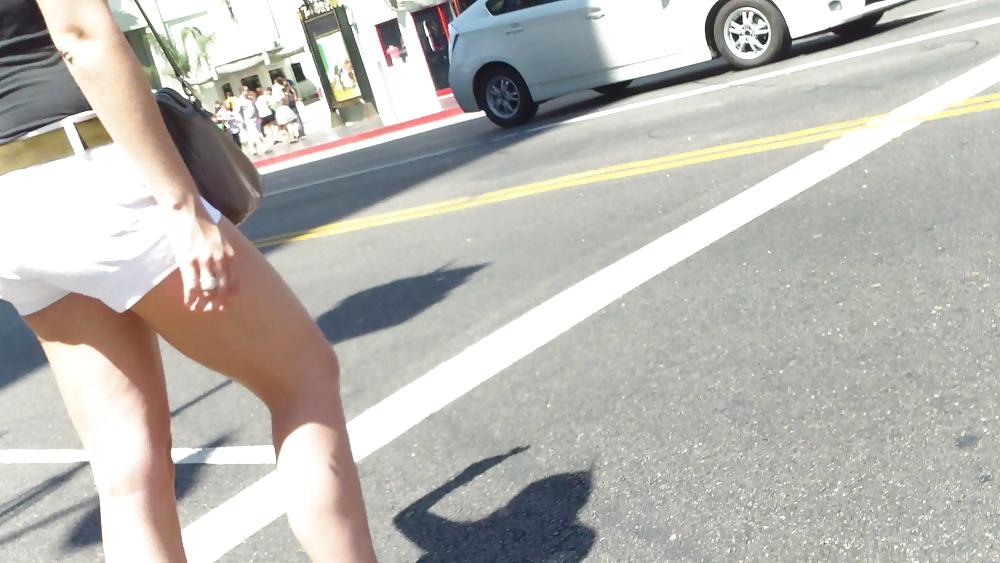 23P Teen ass crack & butt in tight white shorts