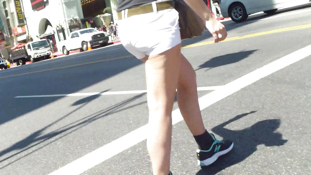 23P Teen ass crack & butt in tight white shorts