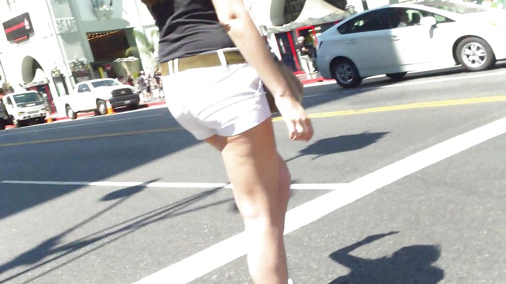 23P Teen ass crack & butt in tight white shorts
