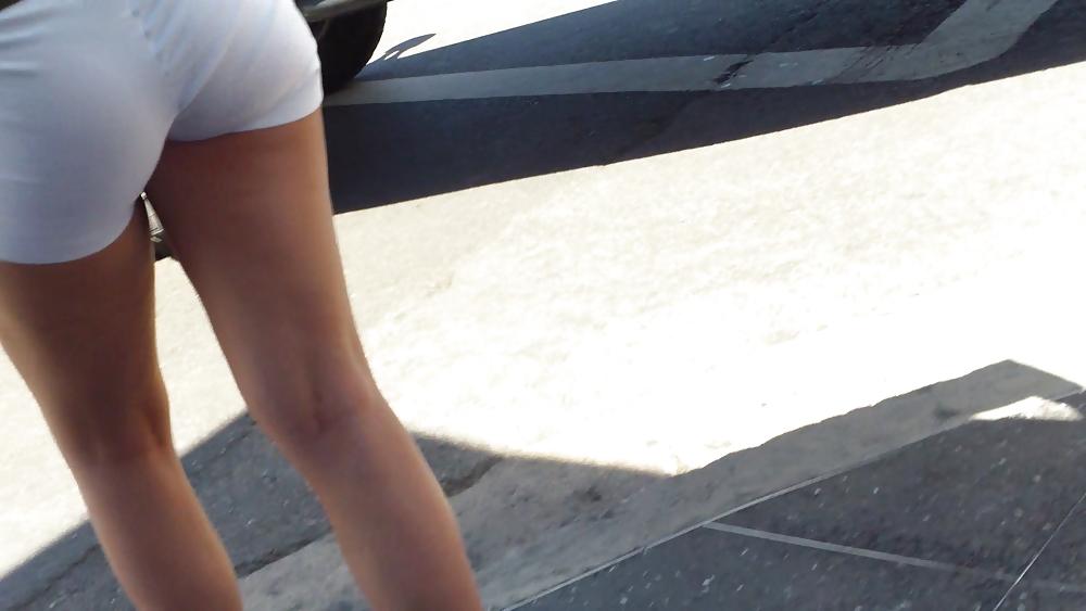 23P Teen ass crack & butt in tight white shorts