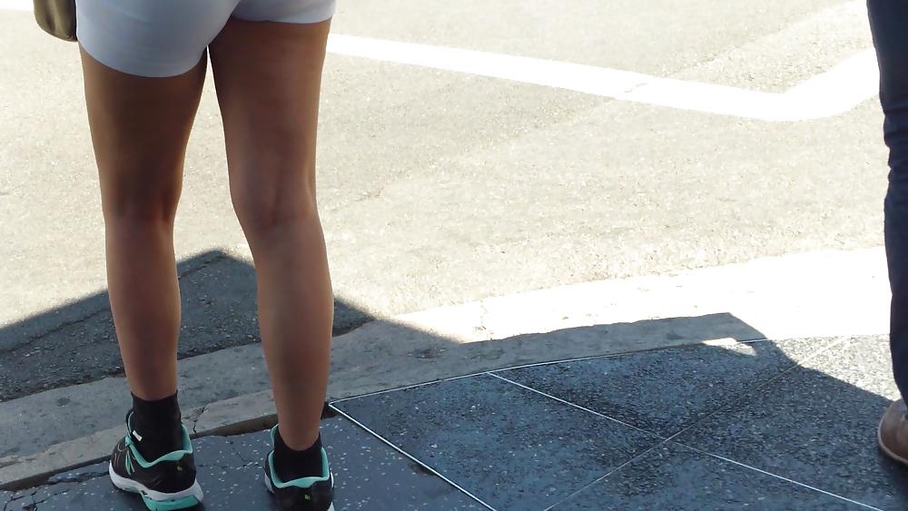 23P Teen ass crack & butt in tight white shorts