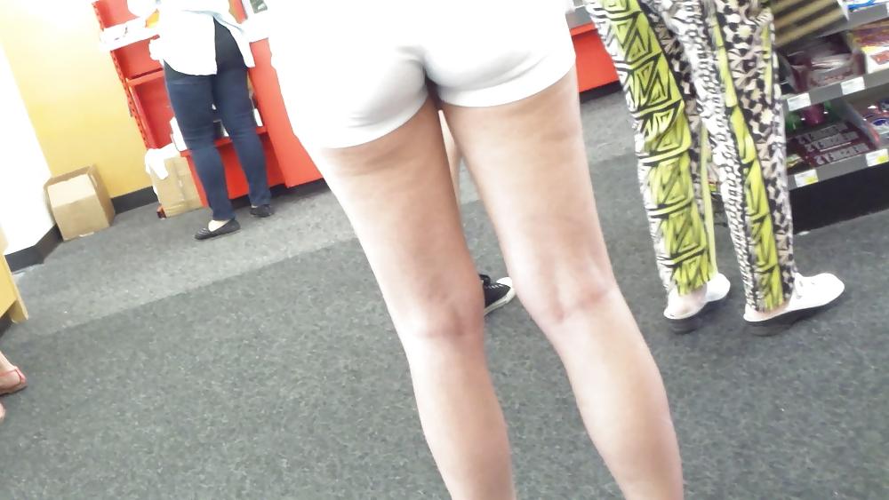 23P Teen ass crack & butt in tight white shorts