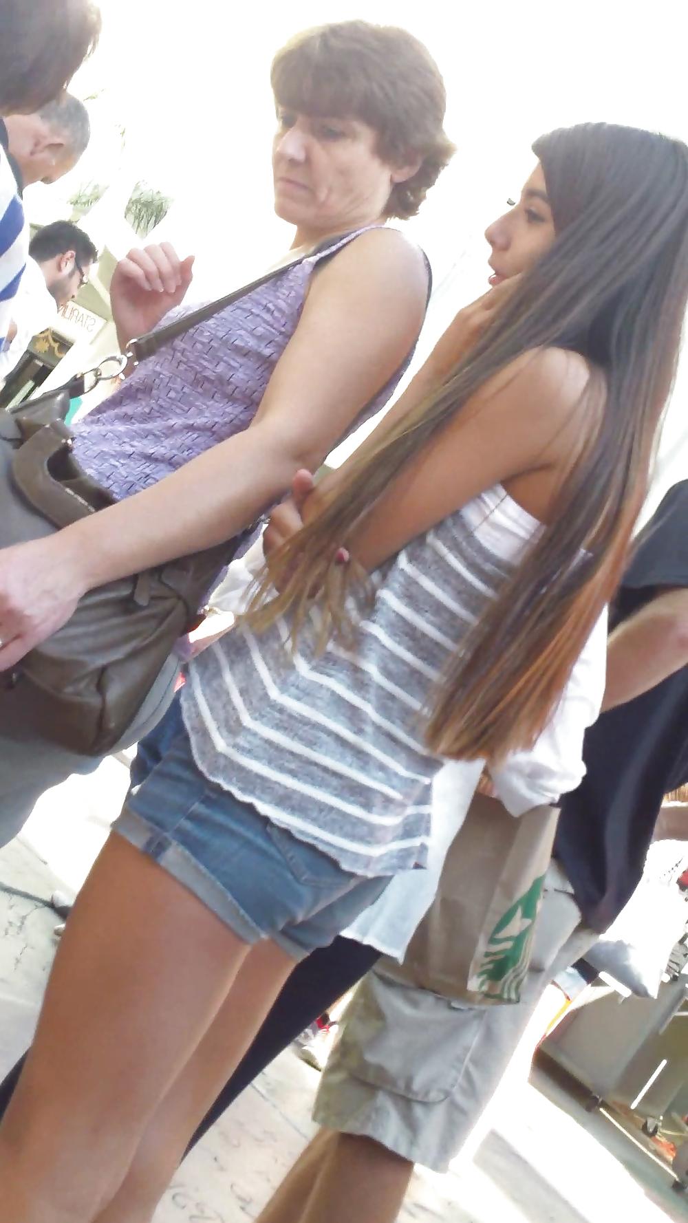 25P Teen ass crack & butt cheeks in jean shorts 