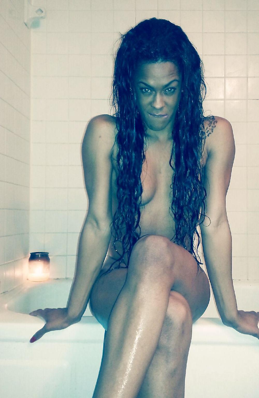 8P Ebony Ladyboy Poses