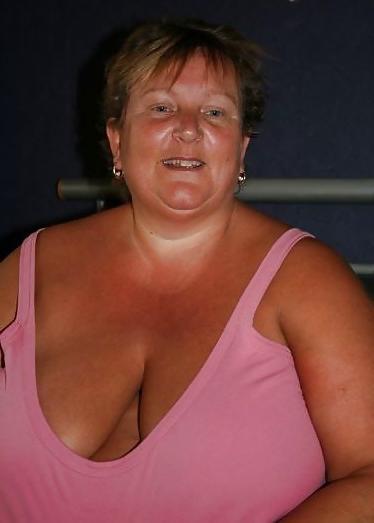 20P Not naked busty mature women 5.
