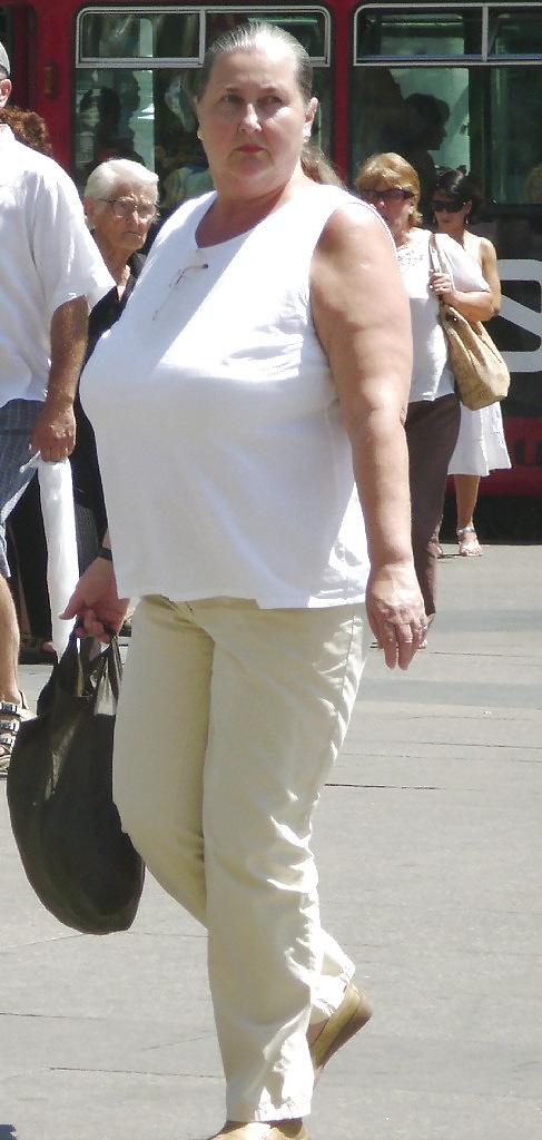 20P Not naked busty mature women 6.