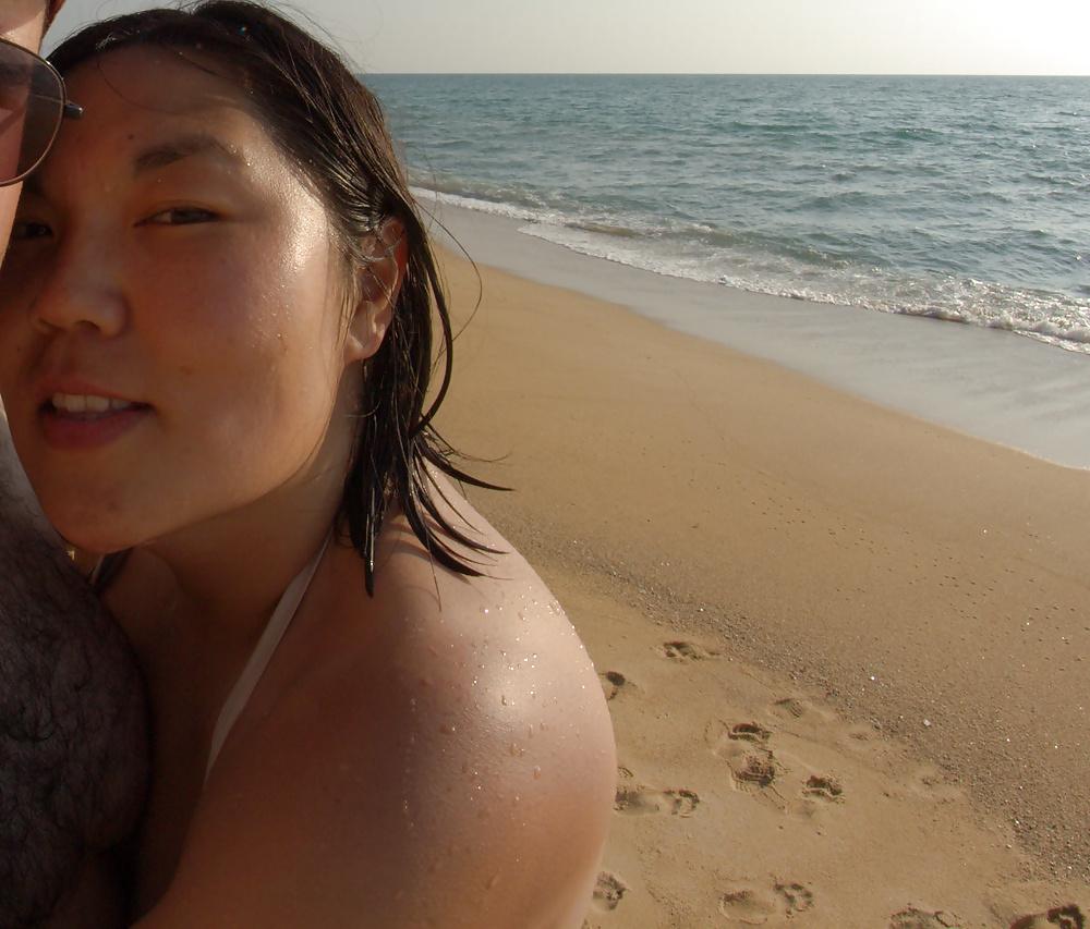 25P Asian wife big tits in swimsuit 