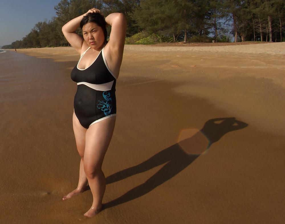25P Asian wife big tits in swimsuit 