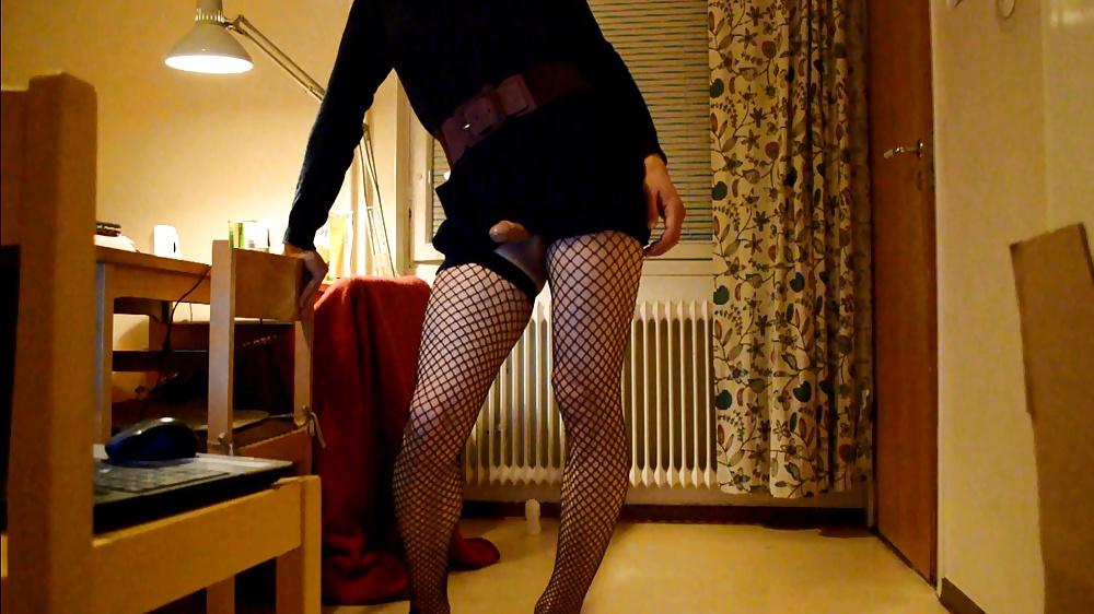 6P Trap in dress and stockings with buttplug behind