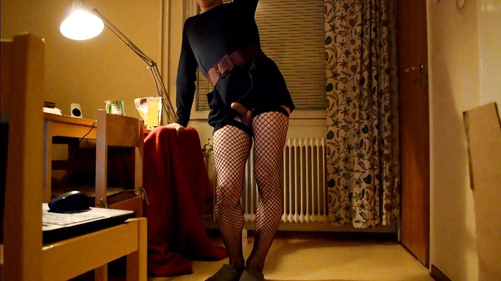 6P Trap in dress and stockings with buttplug behind