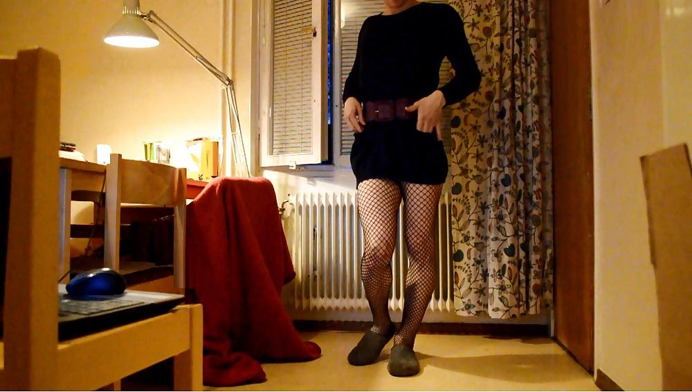 6P Trap in dress and stockings with buttplug behind