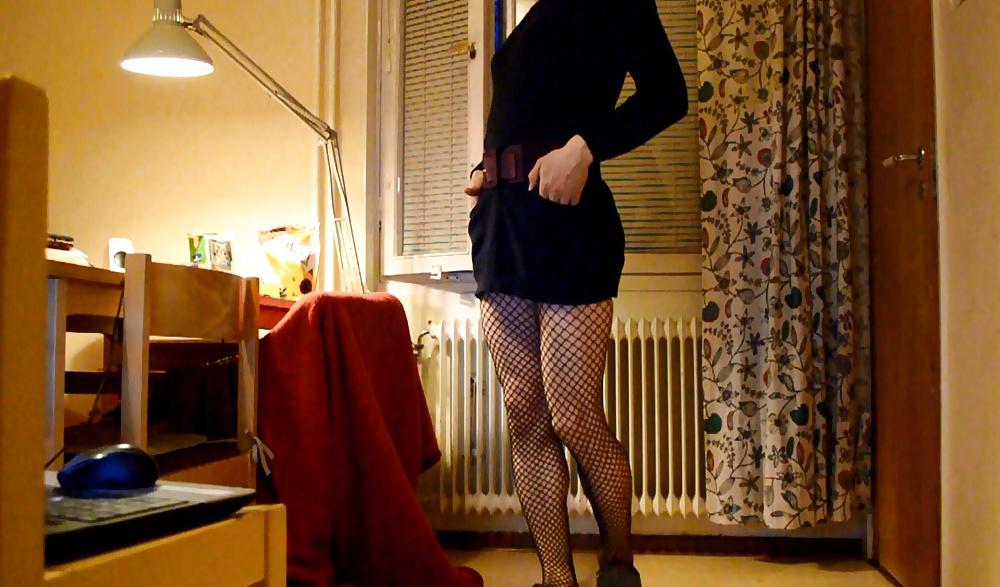 6P Trap in dress and stockings with buttplug behind