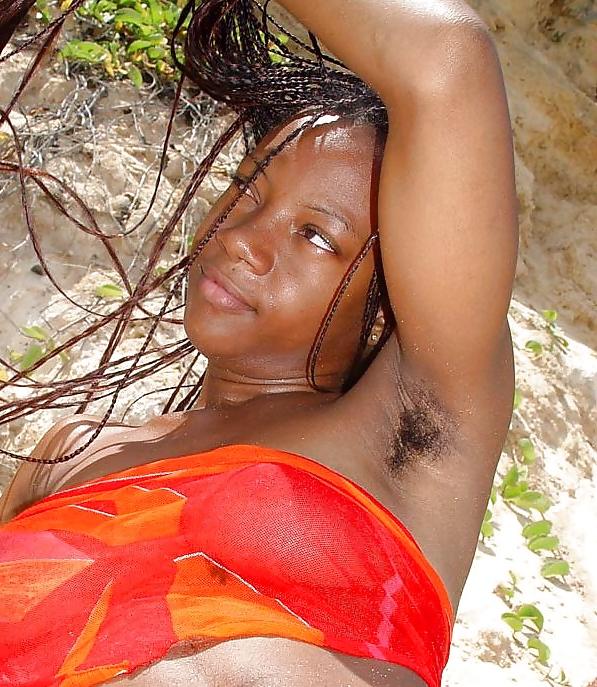 17P Coco, ebony girl showing hairy armpits and pussy