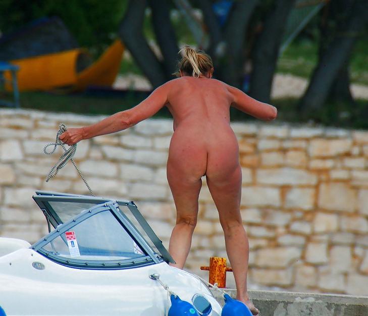 14P Nude Mature Lady Boating