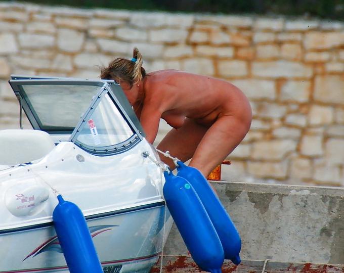 14P Nude Mature Lady Boating