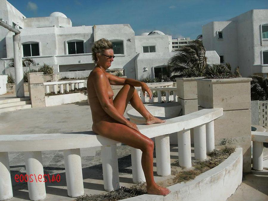 5P Mature Nudist Lady Striking A Pose