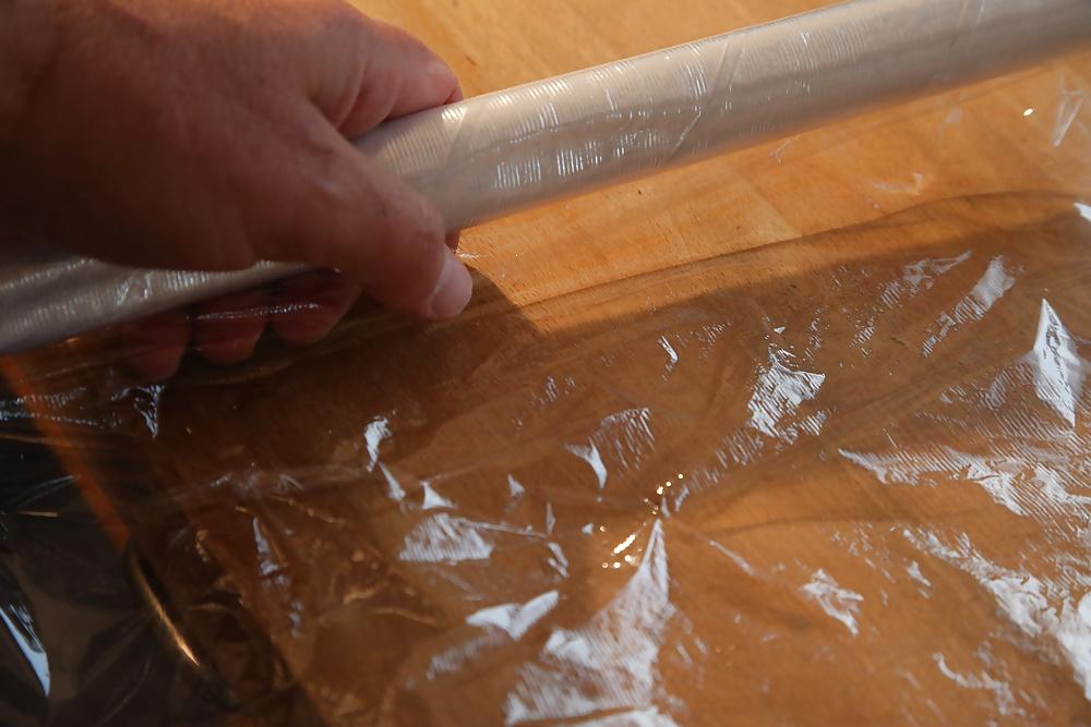 11P Wrapping nettles round cock with cling film