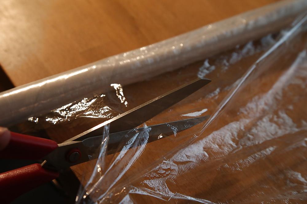 11P Wrapping nettles round cock with cling film