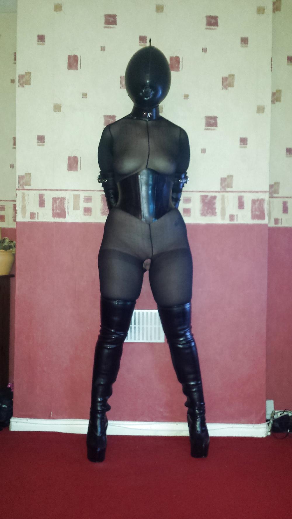 9P Slave girl wearing inflatable rubber hood