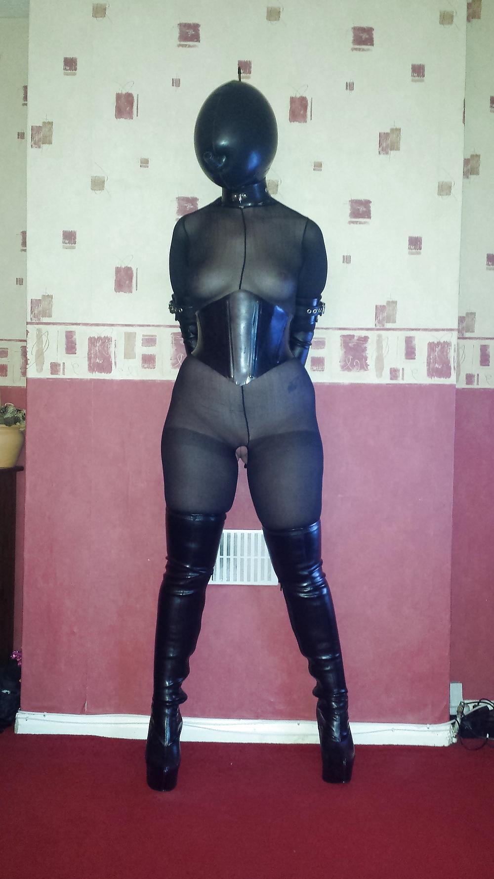 9P Slave girl wearing inflatable rubber hood