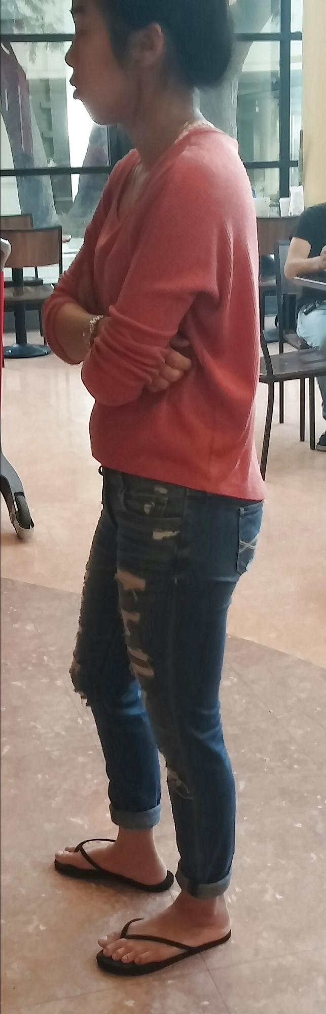 14P Skinny Asian teen feet and ass in jeans with face. 