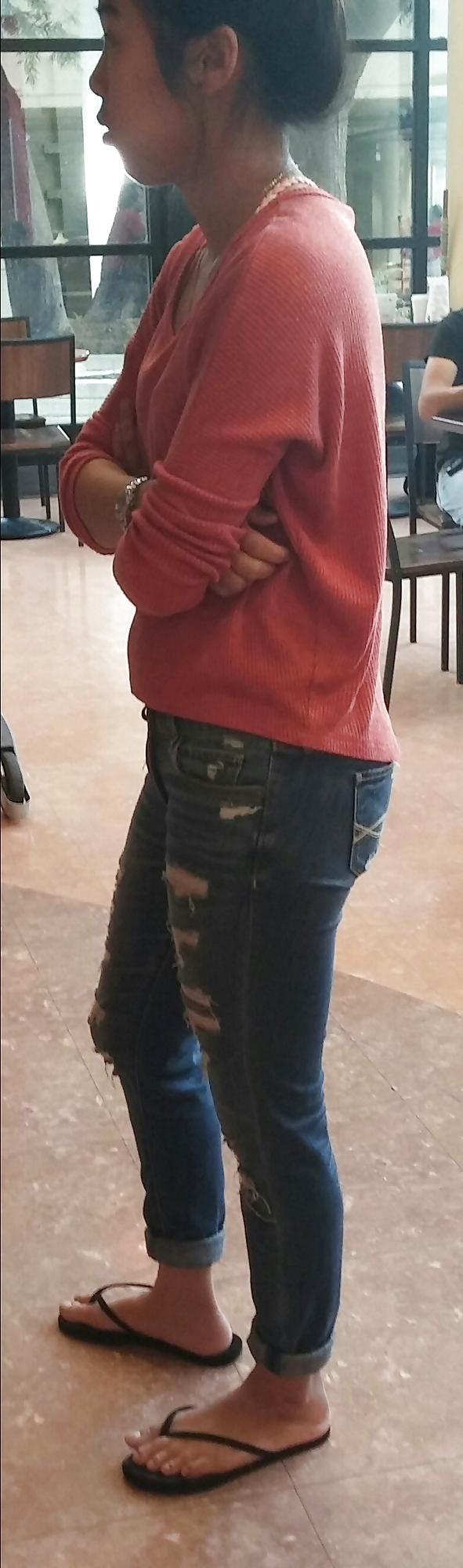 14P Skinny Asian teen feet and ass in jeans with face. 