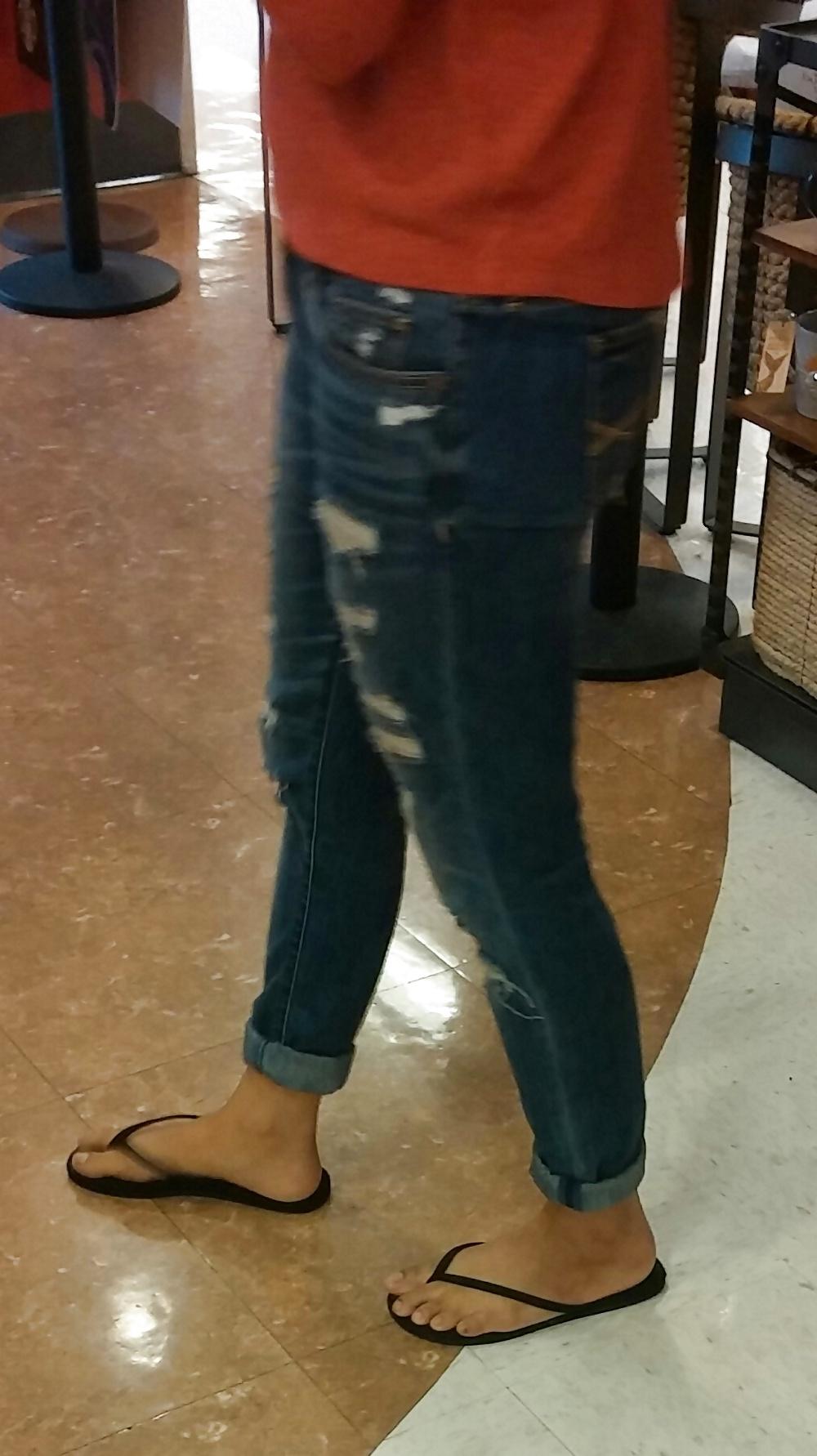 14P Skinny Asian teen feet and ass in jeans with face. 
