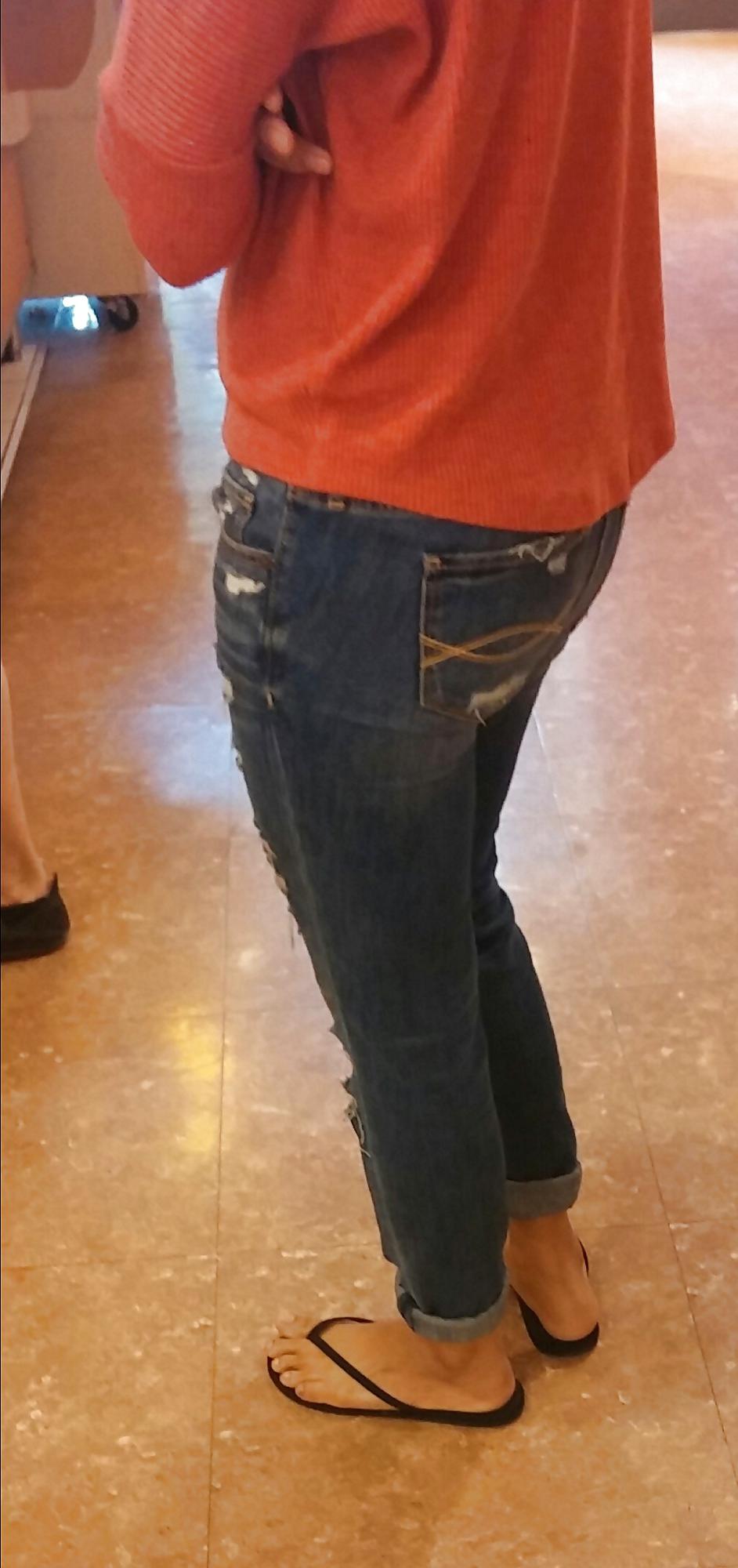 14P Skinny Asian teen feet and ass in jeans with face. 