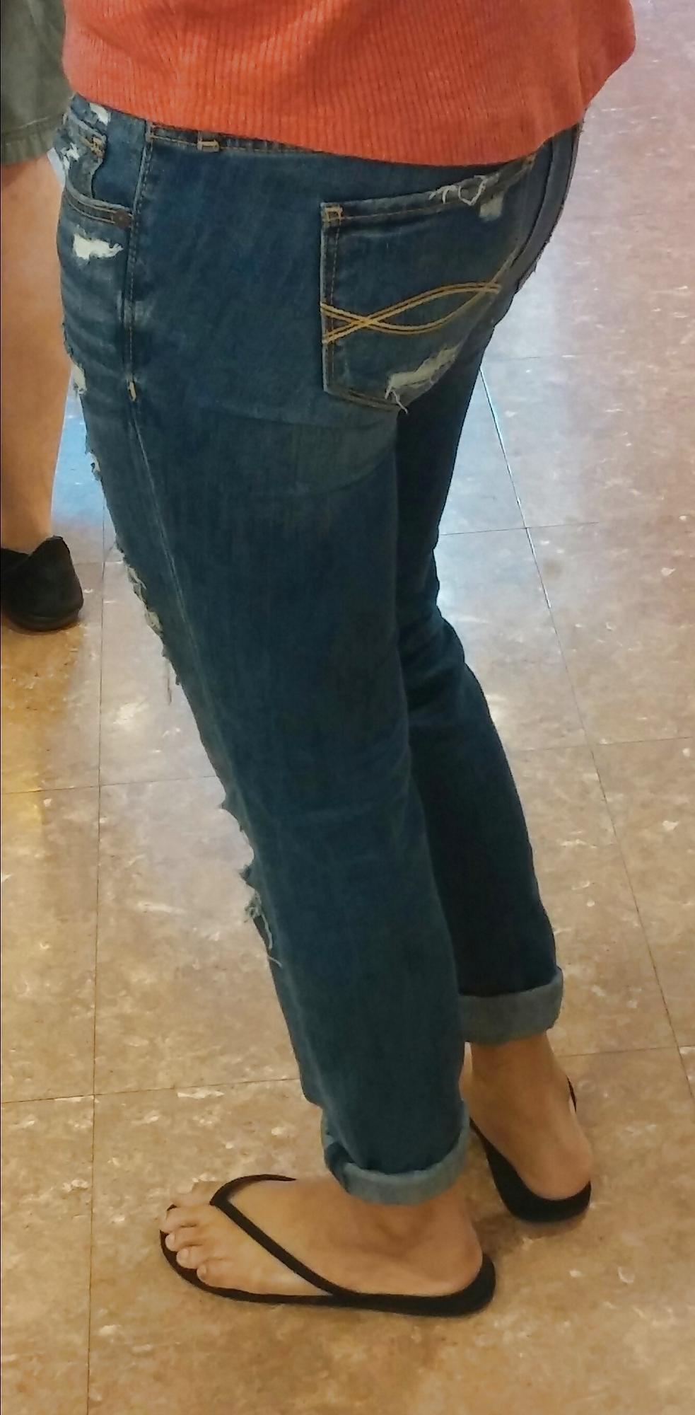 14P Skinny Asian teen feet and ass in jeans with face. 