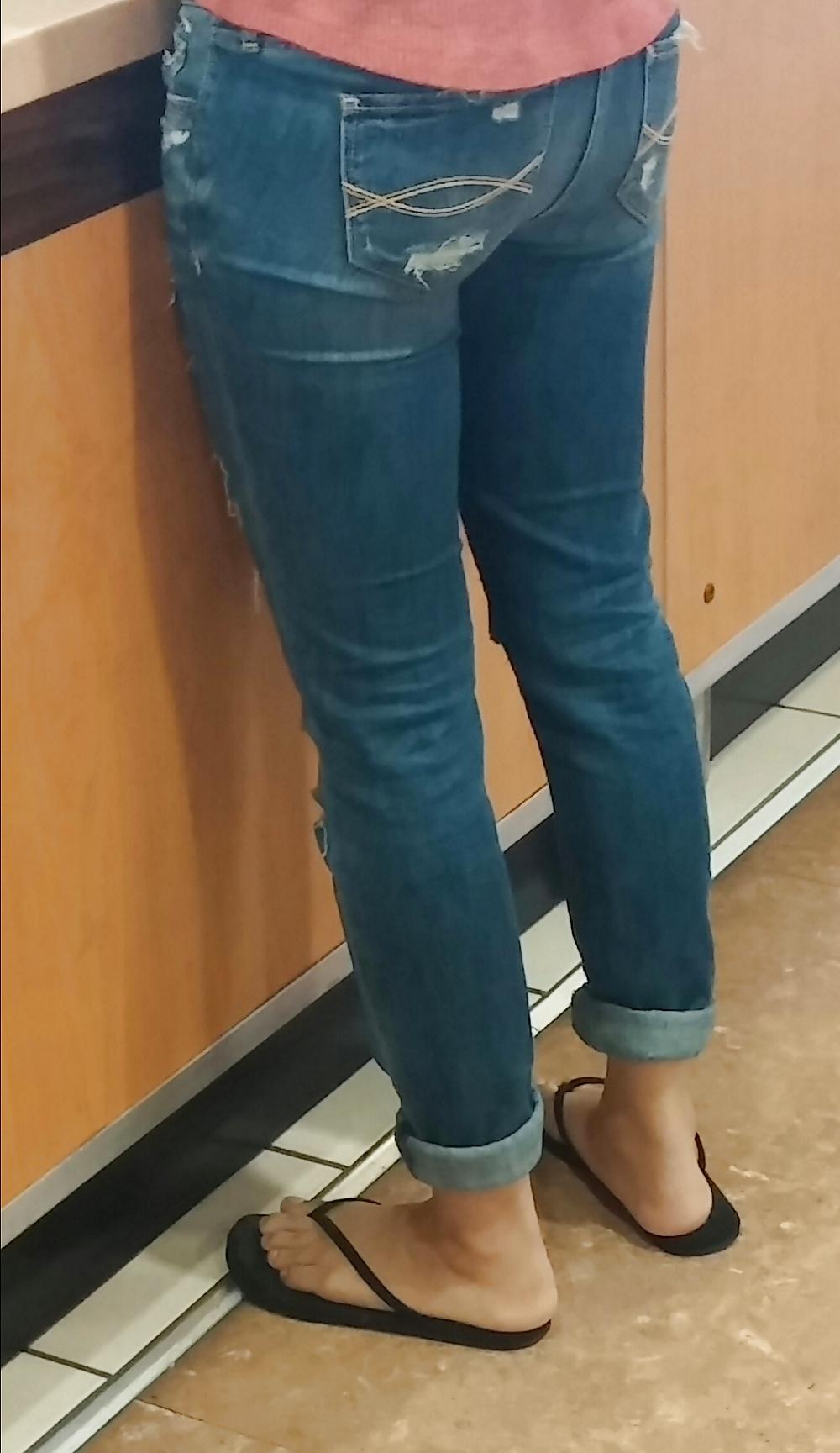 14P Skinny Asian teen feet and ass in jeans with face. 