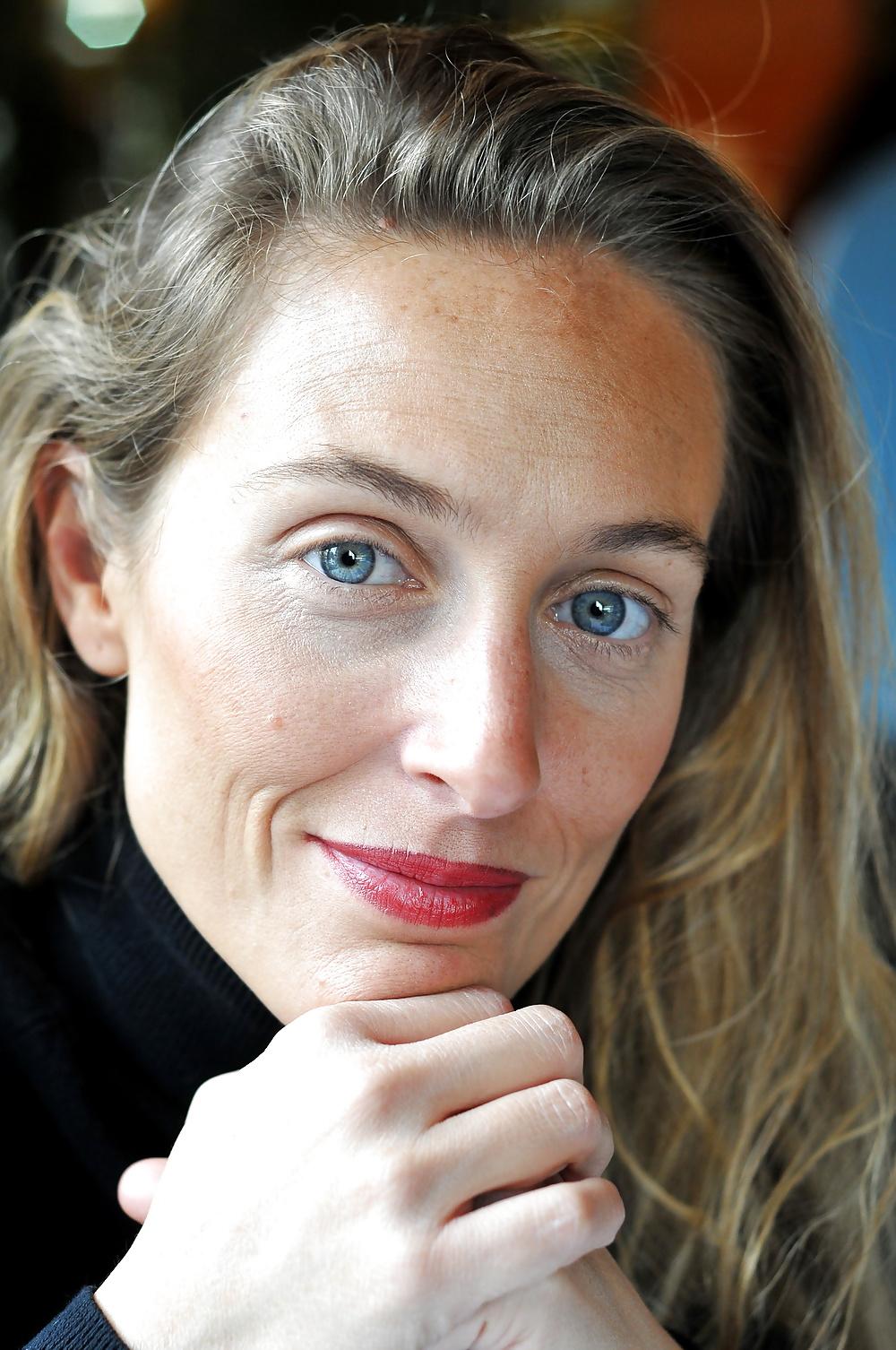 15P Laure does not need tto get naked to make my dick steel hard