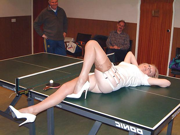 15P Mature leggy lady plays table tennis