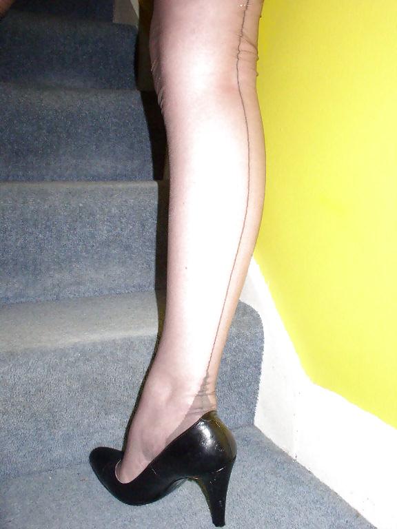 20P 1960s style lady stairs at party