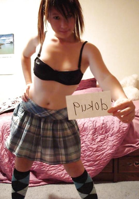 25P Cute Asian posing in front of Webcam.