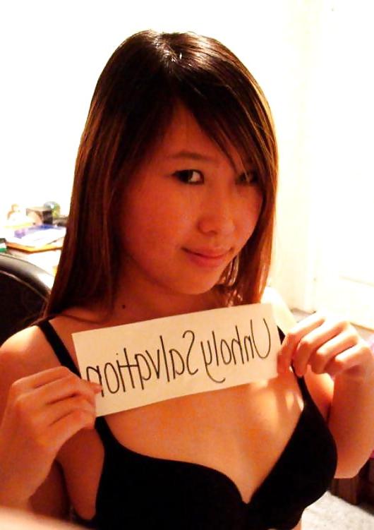 25P Cute Asian posing in front of Webcam.