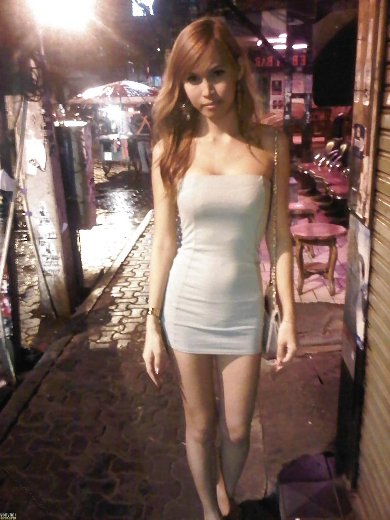 25P Thai ladyboys in thongs and dresses