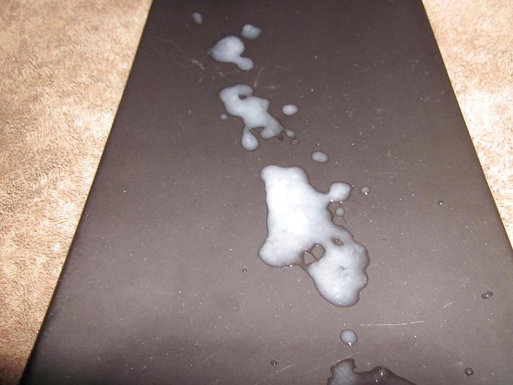 6P Close up cum shot on a black plate